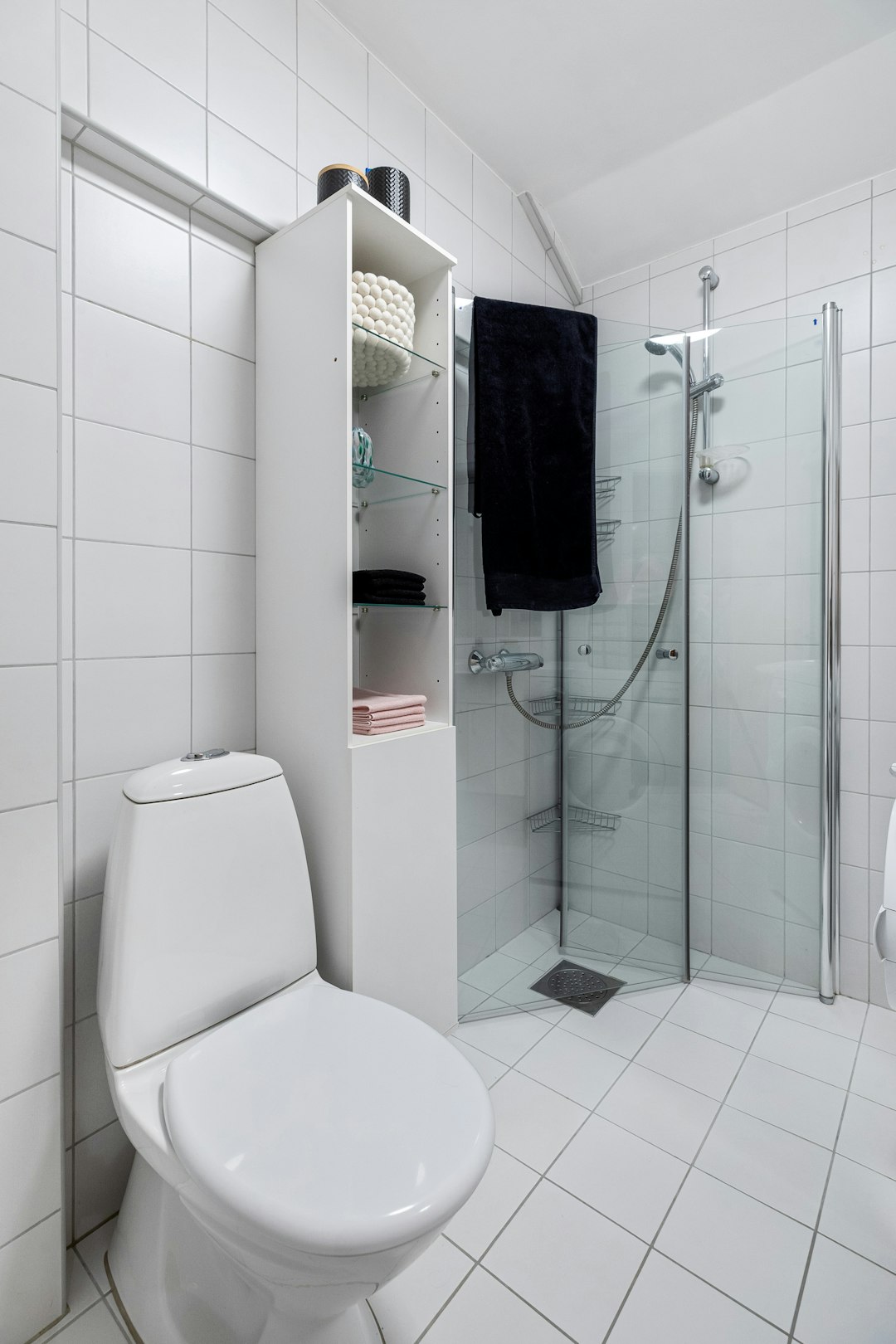 Services a-white-toilet-sitting-next-to-a-walk-in-shower-p2-faaw4thq